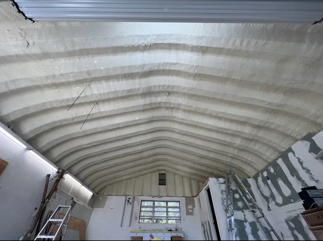 Spray polyurethane foam applied to the underside of a metal roof deck in North Bay Village